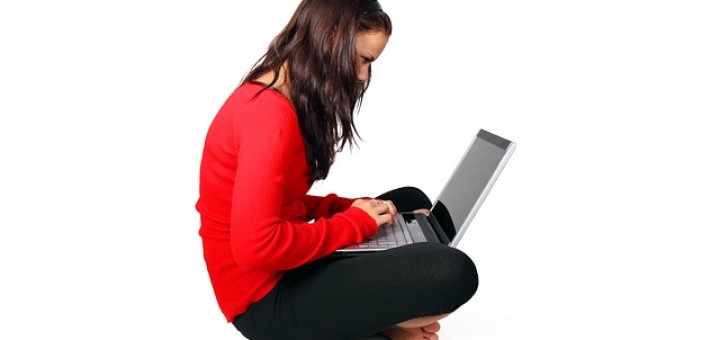 A lady using a laptop