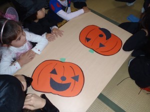 pin the face on the pumpkin