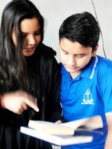 Shrishti working with a student